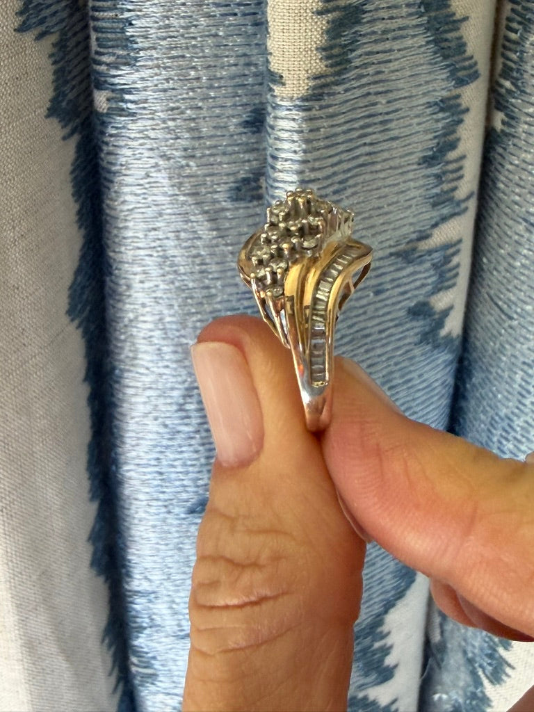 10k Round Diamond and Baguette Swirl Ring
