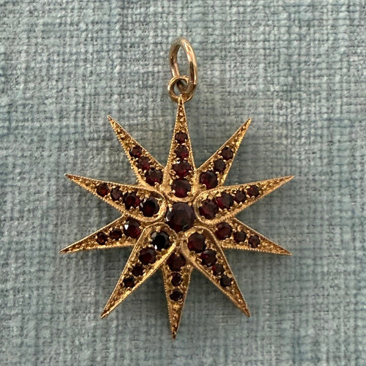 10k Star Pendant with Garnets