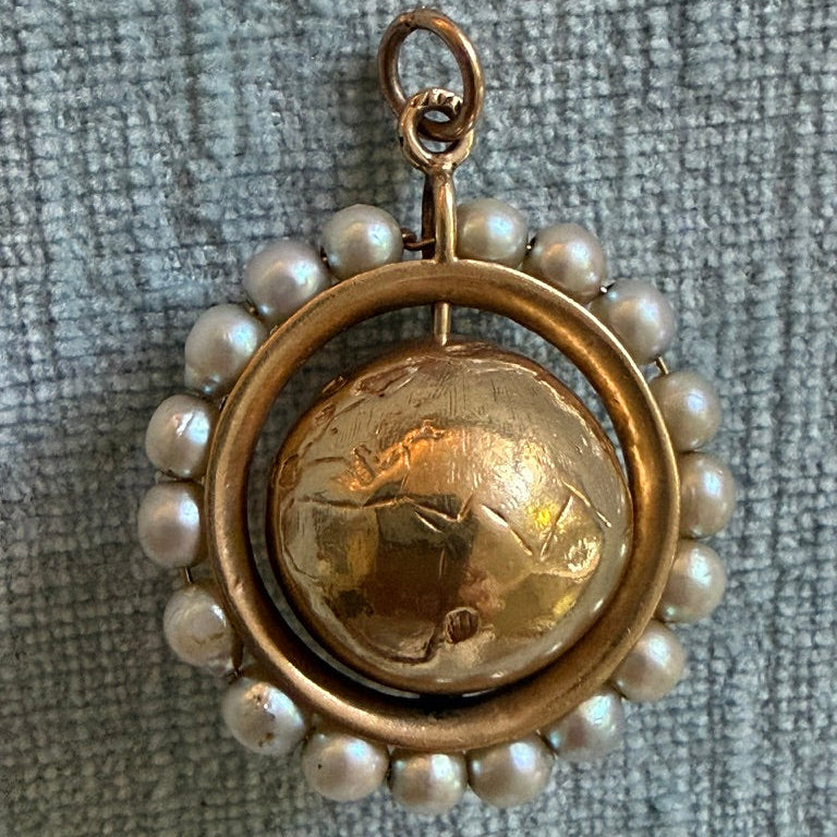 14k Articulated Globe Charm Surrounded by Seed Pearls
