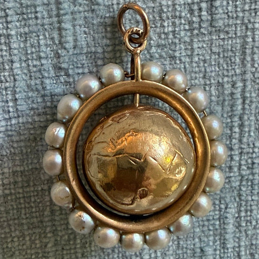 14k Articulated Globe Charm Surrounded by Seed Pearls