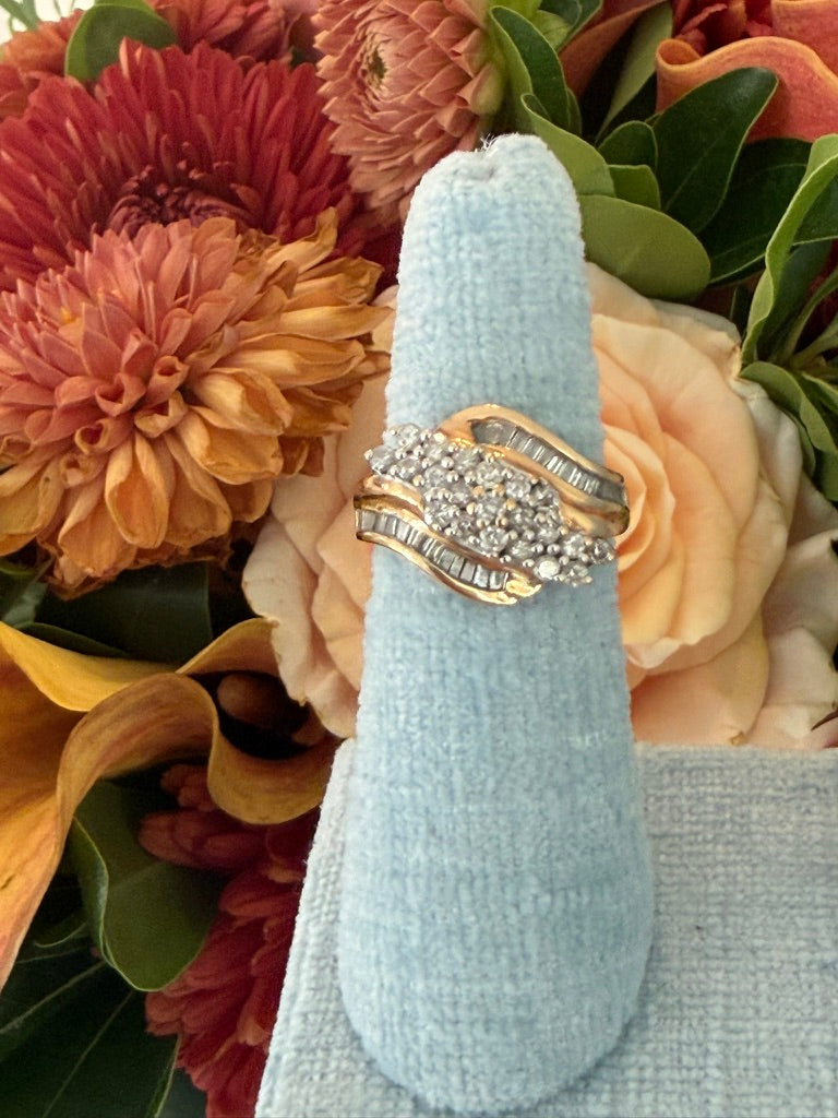 10k Round Diamond and Baguette Swirl Ring